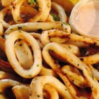 Fried Calamari · Well seasoned fresh seafood calamari.