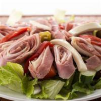 Antipasto Salad · Over garden salad.