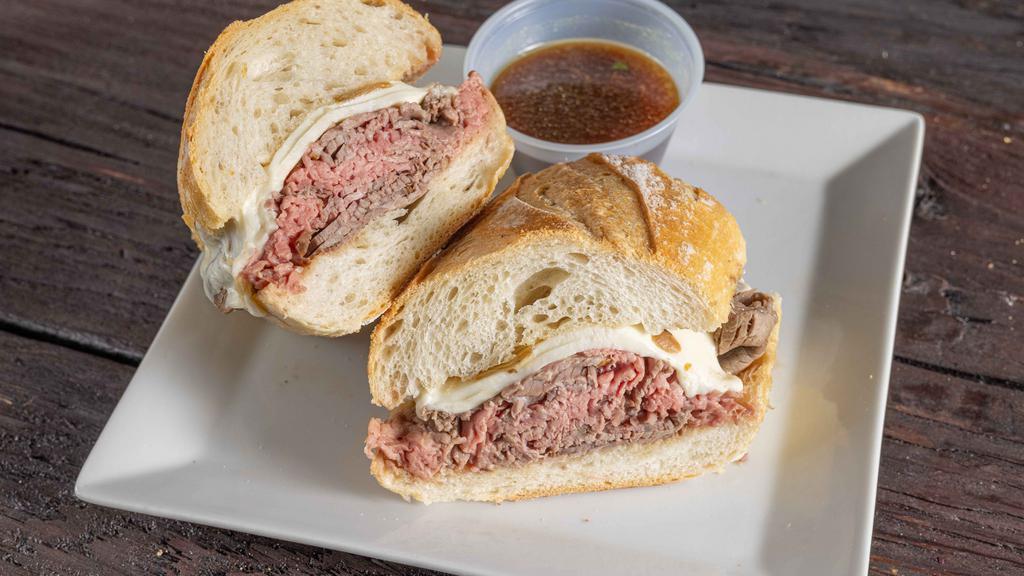 Beef Eater · Roast beef, caramelized onions, Russian and Muenster.