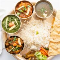 Daal Bhaat Massu · Typical Himalayan platter with a choice of veg, chicken, lamb or goat this platter is served...