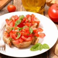 Bruschetta Di Pomodori · Tomatoes, garlic tossed in extra virgin olive oil and balsamic vinegar, mozzarella cheese an...