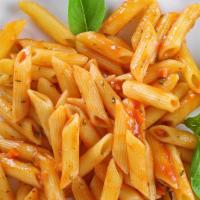 Penne A La Vodka · Tomato sauce accented with vodka, pancetta, and made velvety with heavy cream.