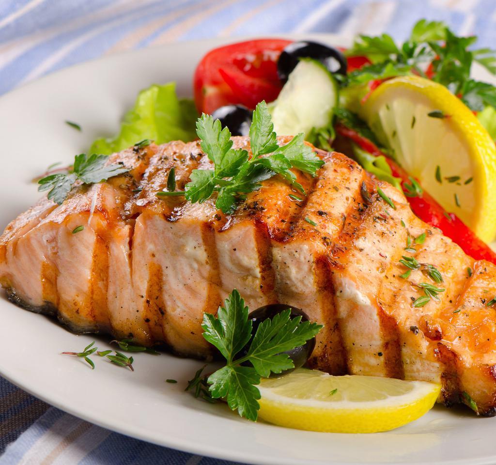 Grilled Salmon · Grilled salmon filet. Served with mixed salad.