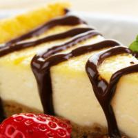 Italian Cheesecake · Homemade rich and creamy cheesecake, sweet dough crust, topped with caramelized brown sugar.