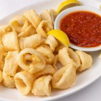 Calamari Fritti · Lightly flour dusted and fried served with homemade tomato sauce.