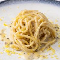 Bucatini Cacio E Pepe · Pasta with cracked black pepper with mix of pecorino and Parmigiano cheese in a butter sauce.