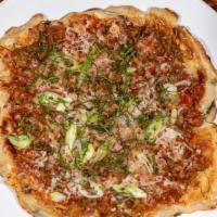 Scallion Pancake Pizza · Our crispy and chewy Taiwanese scallion pancake topped with your choice of either grass-fed ...