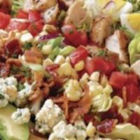 Cobb Salad · Served with strips of grilled chicken, bacon, Monterey Jack cheese, tomatoes, hard boiled eg...