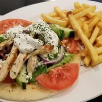 Chicken Souvlaki · Served with a small Greek salad and your choice of side.