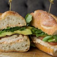 Roasted Chicken Sandwich · Roasted Chicken, Chili Mayo, Pickled Onions, Arugula, Sliced Avocado on a French Baguette

(...
