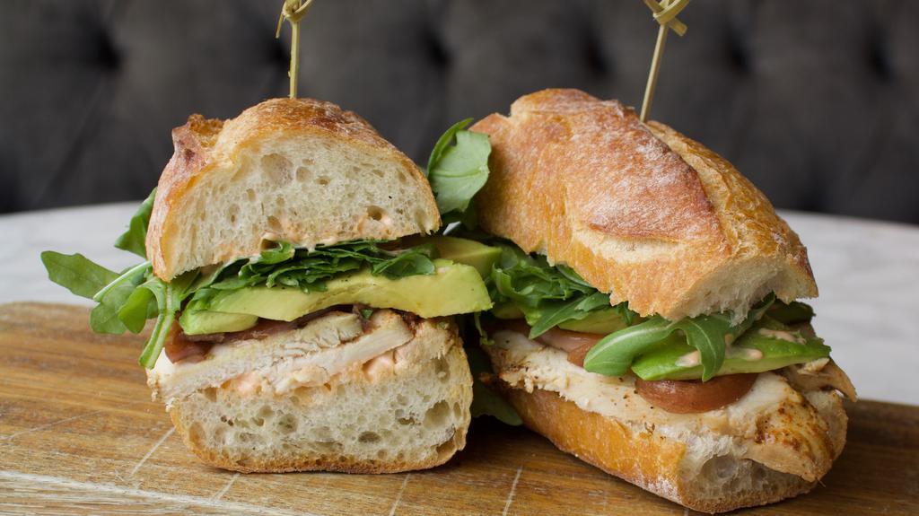 Roasted Chicken Sandwich · Roasted Chicken, Chili Mayo, Pickled Onions, Arugula, Sliced Avocado on a French Baguette

(No substitutions allowed)