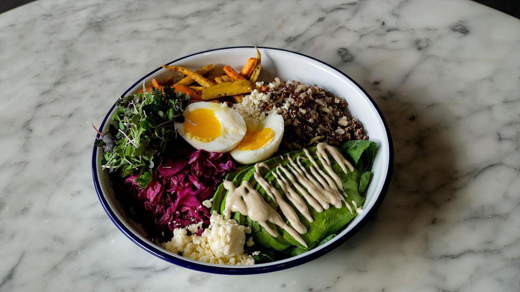 Quinoa Avocado Bowl · Roasted carrots, avocado, red quinoa with brown rice, crumbled feta cheese, soft boiled egg, micro-greens with a lemon tahini dressing. (no substitutions)
