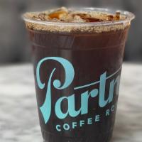 Iced Americano  · 4oz Double shot of espresso over water and ice, a refreshing treat