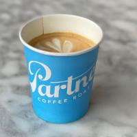 Cortado · 4 oz - double shot of espresso with textured milk, served in a 6 oz cup.