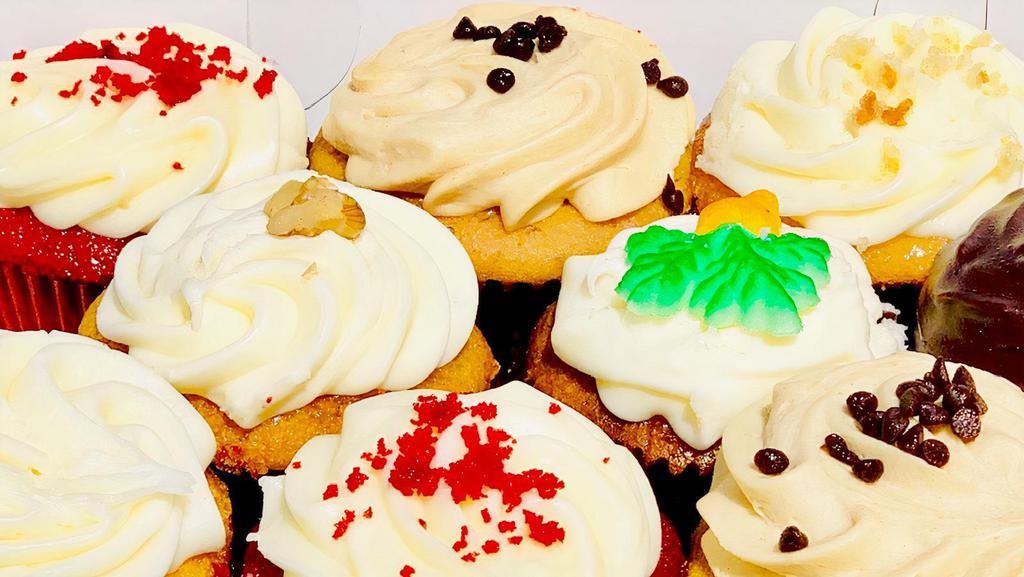 1 Dozen Assorted Cupcakes · Assorted flavors. Mix of our assorted cupcakes.  This item is only assorted no specific Cupcakes.
Keep refrigerated after four hours.