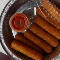 Mozzarella Sticks · 7 pieces comes with marinara sauce ... let us know if you like to change the sauce. put your...