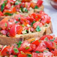 Bruschetta · Chopped Tomatoes/Onions/Garlic/Basil/Olive Oil/Toasted Bread