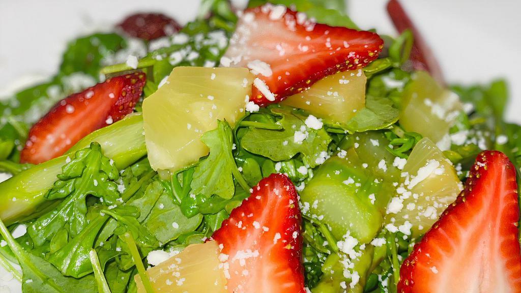 Tropical Salad · Asparagus, strawberries, baby arugula, pineapple, queso fresco and passion fruit vinaigrette.
