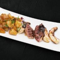 Marinera · Shrimp, mussels, calamari, clams, octopus, Spanish rice, saffron, sofrito and green mojo.