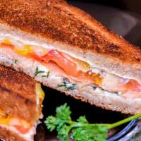 Lox Brunch Sandwich · Alaskan smoked salmon, Tomatoes, capers, red onions, cream cheese and dill