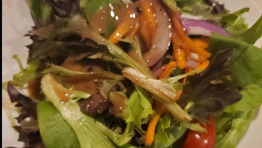 House Salad · Mixed greens, grape tomatoes, red onions, shaved carrots, cucumbers, balsamic vinaigrette dressing.