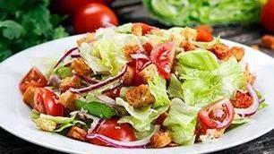 Vespucci'S Salad · Romaine, black olives, shredded carrots, grape tomatoes, seedless cucumbers, balsamic vinaig...