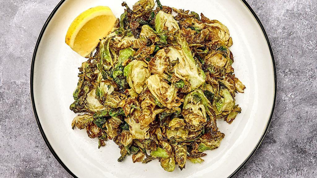 Crispy Brussels Sprouts · Crispy fried Brussels sprouts with lemon and salt.