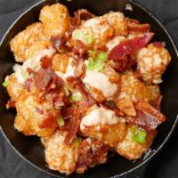 Bacon Truffle Tots · Tater tots with zesty truffle aioli and bacon crumble