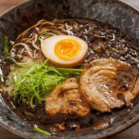 Musashi Pork Shio Black Ramen · Wavy, thick egg noodles in a salt-based 