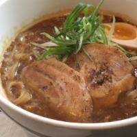 Curry Ramen · Curry based ramen noodle soup with pork cha-siu or chicken cha-siu, egg amd scallion.