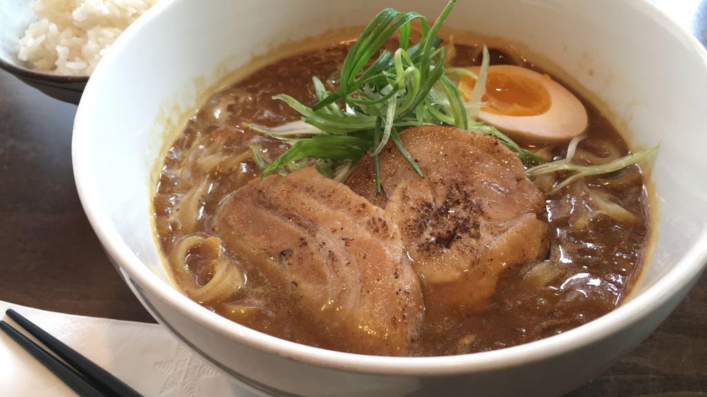 Curry Ramen · Curry based ramen noodle soup with pork cha-siu or chicken cha-siu, egg amd scallion.