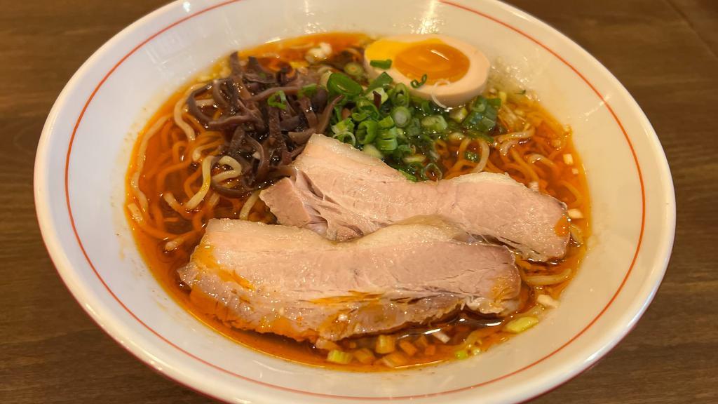 Soy Sauce Ramen Spicy · Soy sauce based clear soup ramen with pork cha-siu or chicken cha-siu, scallion and menma.