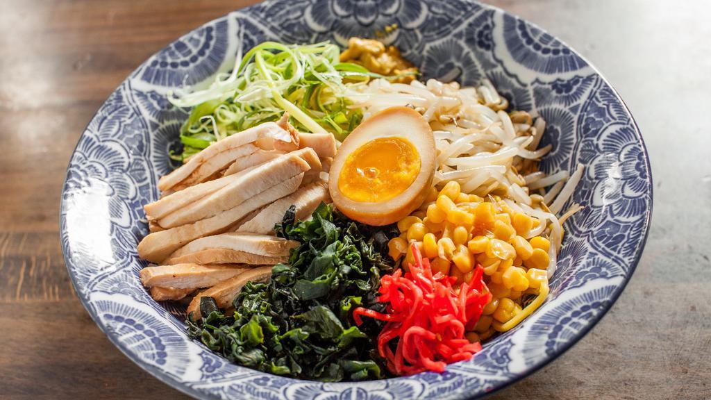 Hiyashi Chuka · Boiled wavy, thick egg noodles with chicken, bean sprouts, wakame seaweed, corn, egg, scallions, and red ginger pickles, with a soy -based vinaigrette sauce.