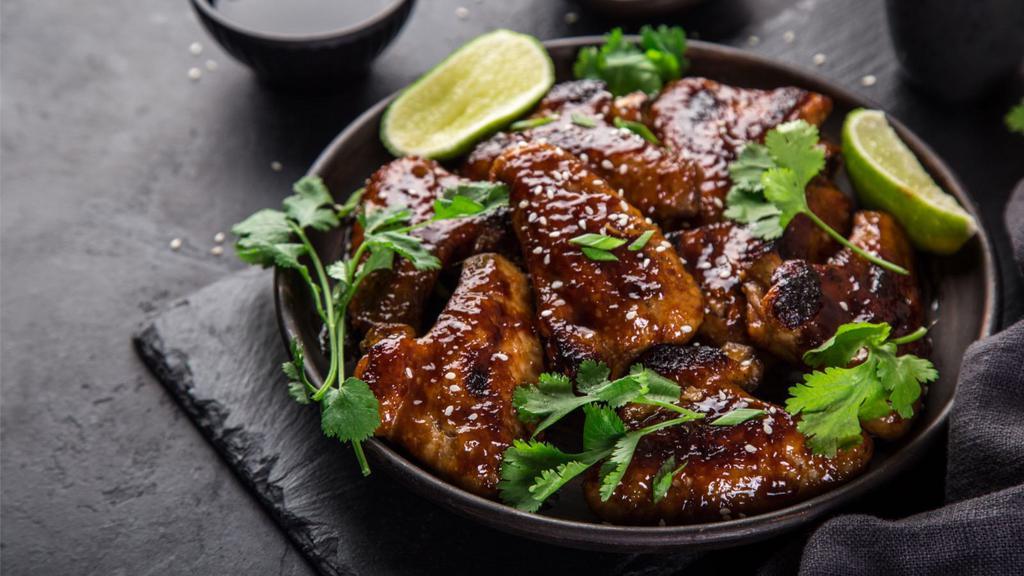 The Teriyaki Wings · Chicken wings fried to golden perfection, topped with Teriyaki sauce.