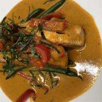 Panang Curry · Mild spicy. Coconut milk, bell pepper, string bean, lime leaves.