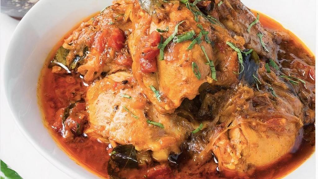 Chettinad Chicken Curry · Chettinad style chicken curry cooked with chef's special spices.