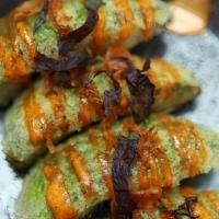 Avocado Fries · Four pieces of tempura fried avocados, served with a spicy aioli, crispy shallots and garlic...
