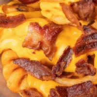 Cheese & Bacon Fries · Signature curly fries tossed with nacho cheese and bacon bits!