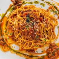 Bolognese · Spaghettini with meat sauce.
