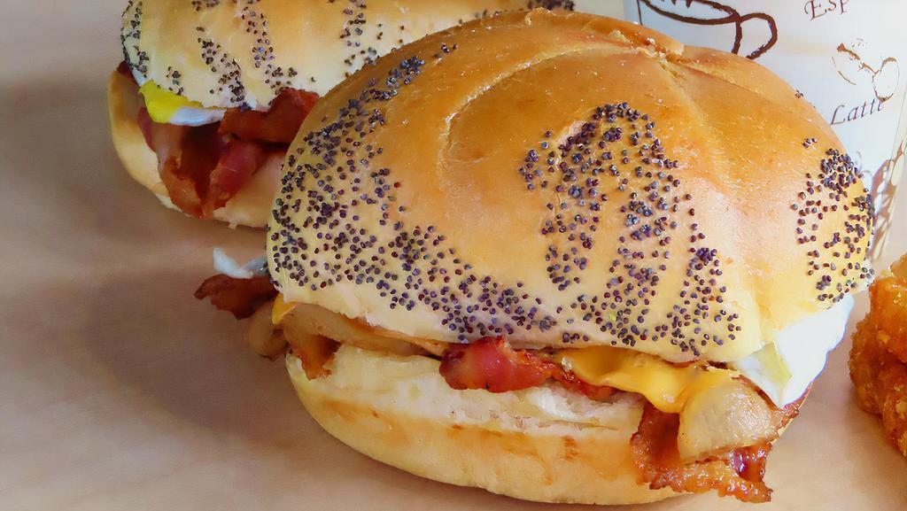 Bacon, Egg & Cheese Sandwich · Cheddar cheese, crispy bacon & an egg on a Kaiser roll