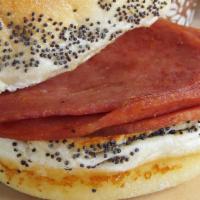 Taylor Ham Breakfast Sandwich · Three pieces of taylor ham or as Jersey calls it Pork Roll, on a kaiser roll.