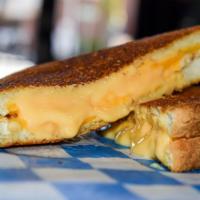Grilled Cheese Sandwich · Golden color bread on the outside, melted american cheese inside. Your choice of white, whea...