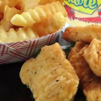 Chicken Nuggets Kids Meal · A 4 piece chicken nugget kids meal comes with a small fry and special kids cup soda