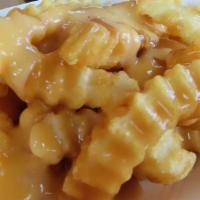 Gravy & Cheese Fries · Our signature fries topped with cheddar cheese sauce and gravy