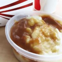 Mashed Potatoes · Mashed potatoes with gravy on top. Choose from Small (8 oz) or Large (16oz)
