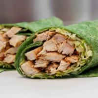 Caesar Grilled Chicken Wrap · With Caesar dressing and romaine lettuce.