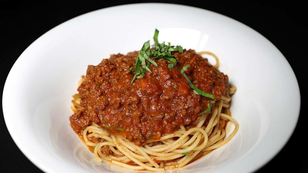 Spaghetti Bolognese · Beef & Lamb Bolognese / Pistachios