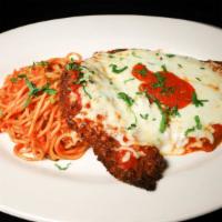 Veal Parmigiana · Breaded veal tomato sauce and mozzarella comes with pasta.