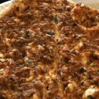Lahmacun · Meat pie anatolia's version of ancient Turkish meat pie with ground lamb, topped with parsle...