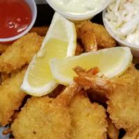 Shrimps And Fries · Golden brown bread shrimp fried to perfection served with seasoned fries., tartar and hot sa...